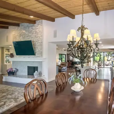 Organic modern kitchen and living area by Snyder Atelier